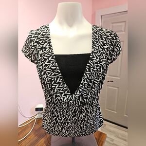 Black and white womans top